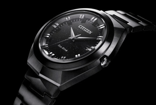 Citizen watch with black face and metal strap, Eco-Drive technology.