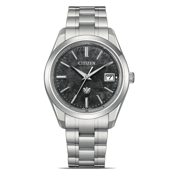 Citizen watch with a dark textured dial and silver bracelet.