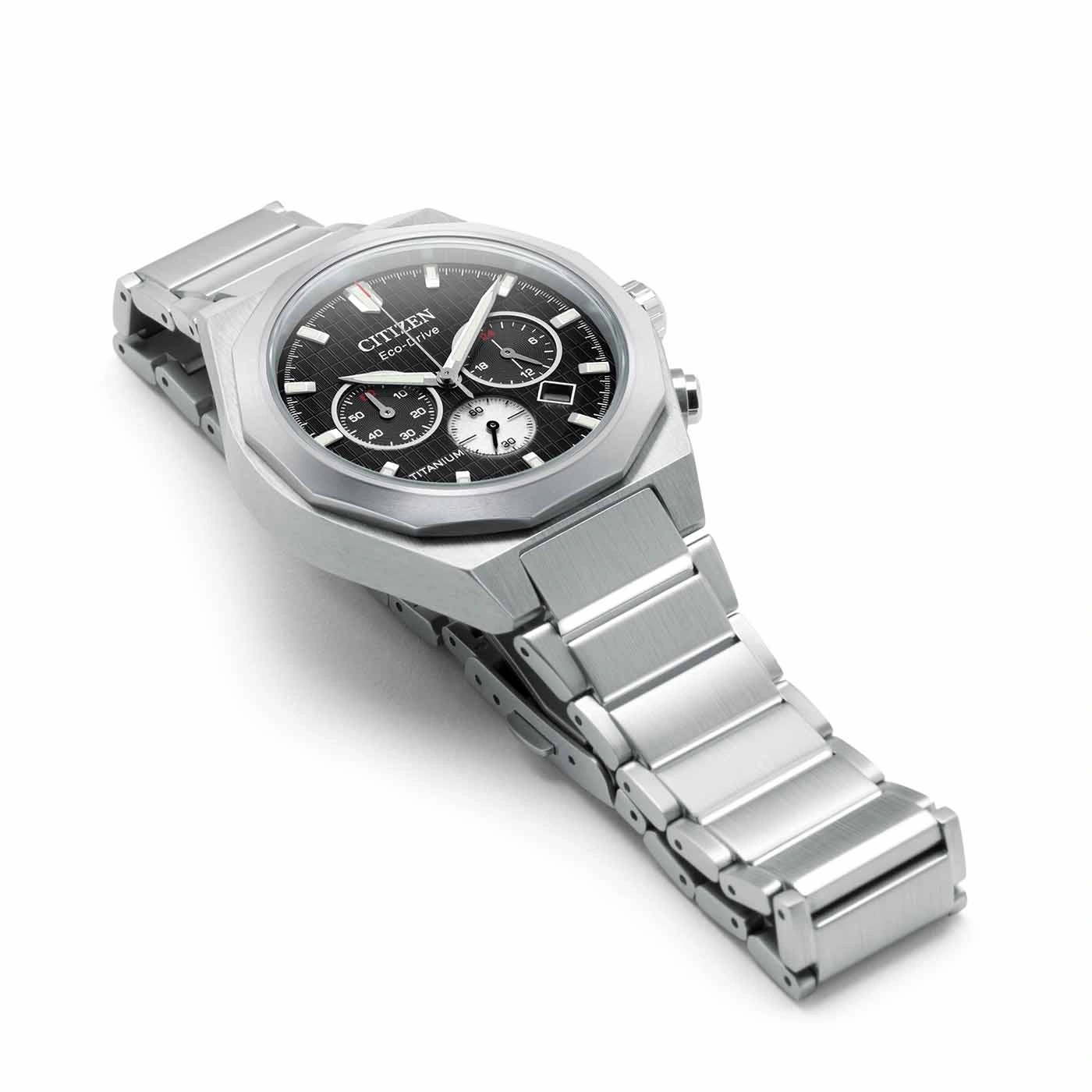 Citizen Eco-Drive titanium watch with black dial and silver bracelet.