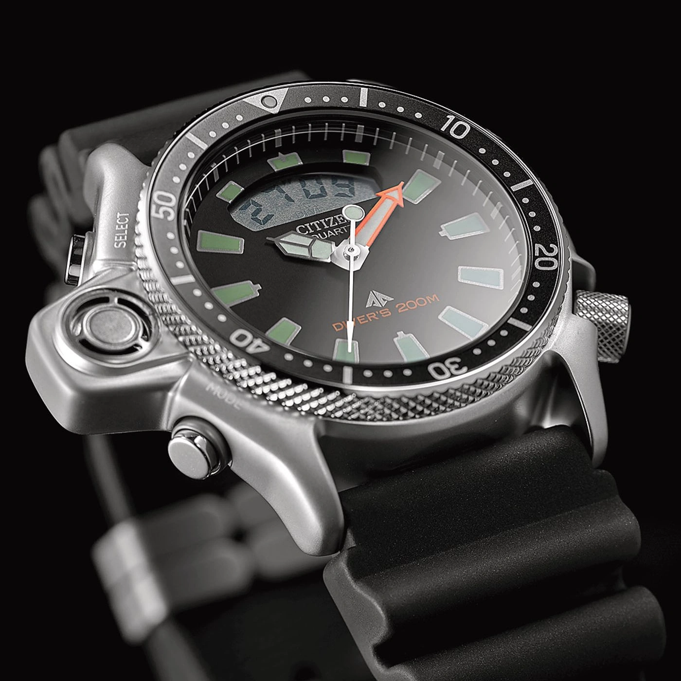 Close-up of a Citizen watch with a black dial and orange hand.