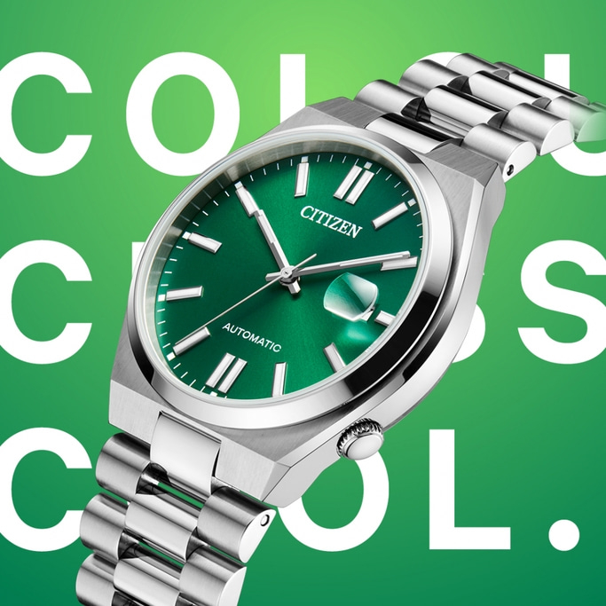 Citizen watch with green face and silver strap, cool design.