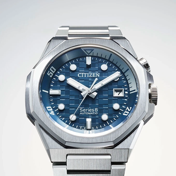Citizen Series 8 automatic watch with blue dial and steel bracelet.