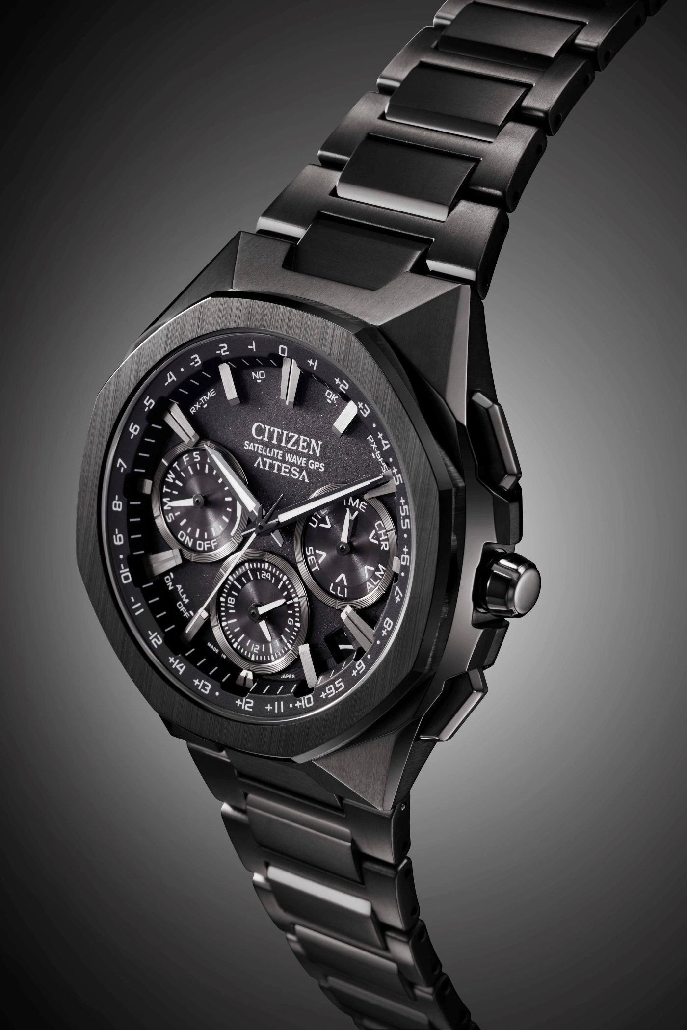 Black Citizen Attesa watch with multiple dials and a metallic strap, close-up shot.